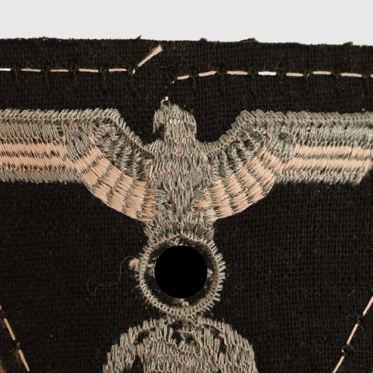 German WWII SS M43 Eagle and Skull Insignia