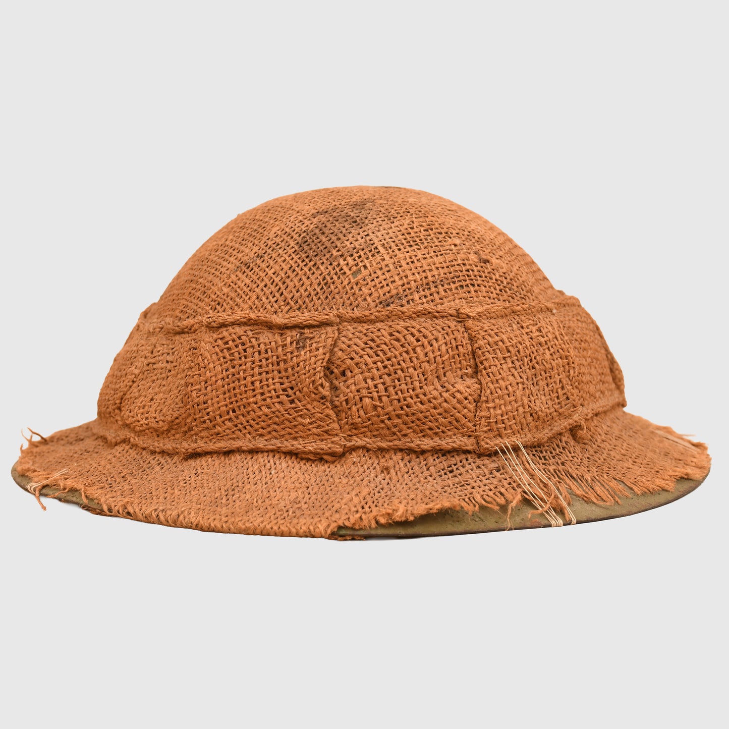 BRITISH WWI 1ST PATTERN BRODIE HELMET WITH A RARE TYPE OF SACKING COVER