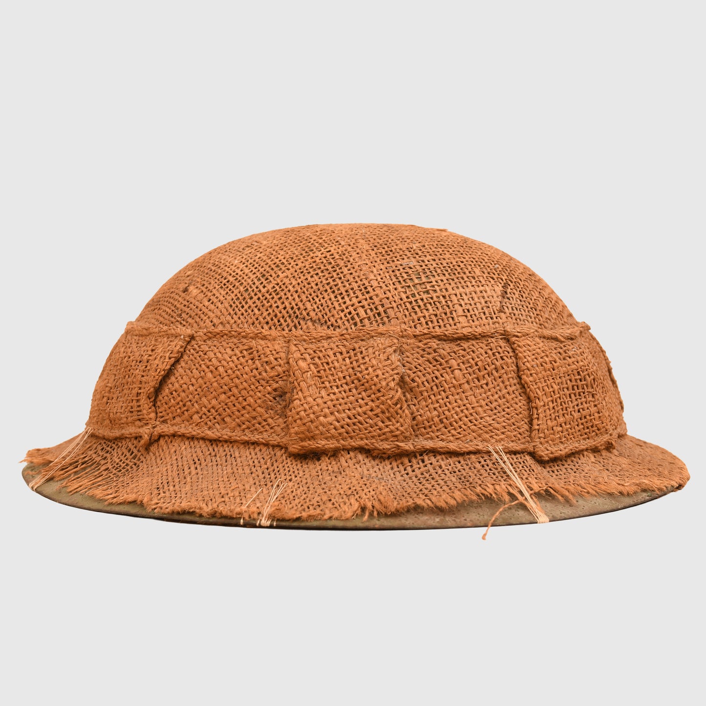 BRITISH WWI 1ST PATTERN BRODIE HELMET WITH A RARE TYPE OF SACKING COVER