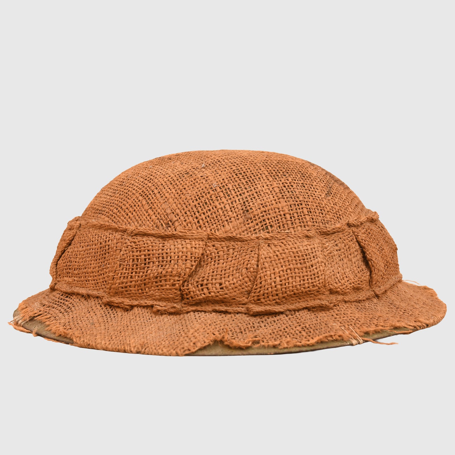 BRITISH WWI 1ST PATTERN BRODIE HELMET WITH A RARE TYPE OF SACKING COVER