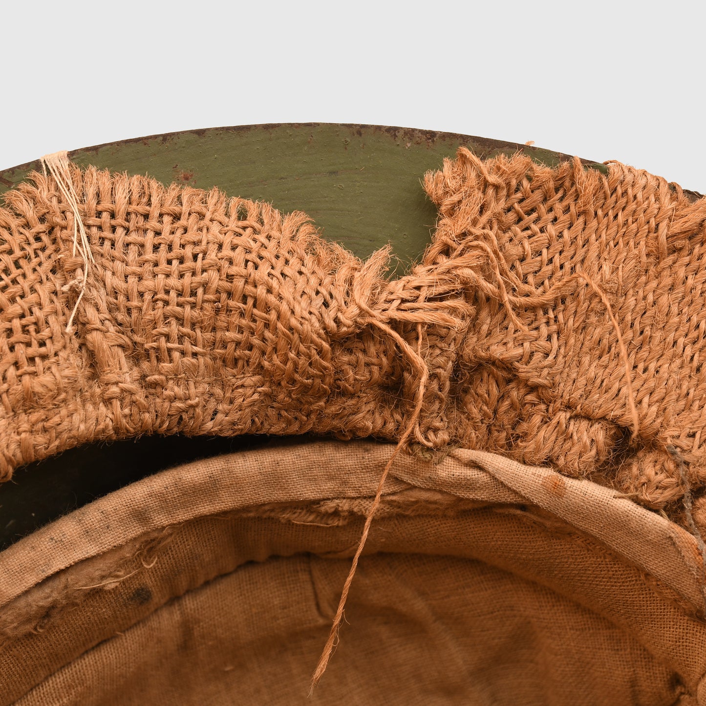 BRITISH WWI 1ST PATTERN BRODIE HELMET WITH A RARE TYPE OF SACKING COVER