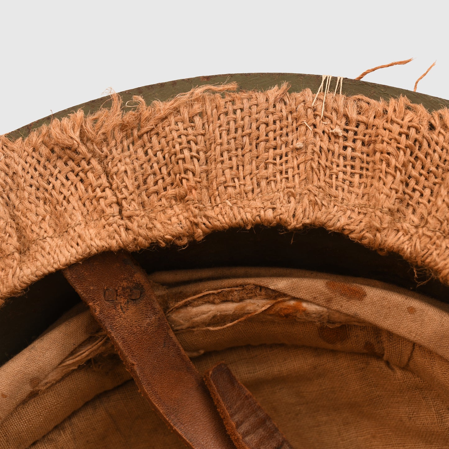 BRITISH WWI 1ST PATTERN BRODIE HELMET WITH A RARE TYPE OF SACKING COVER