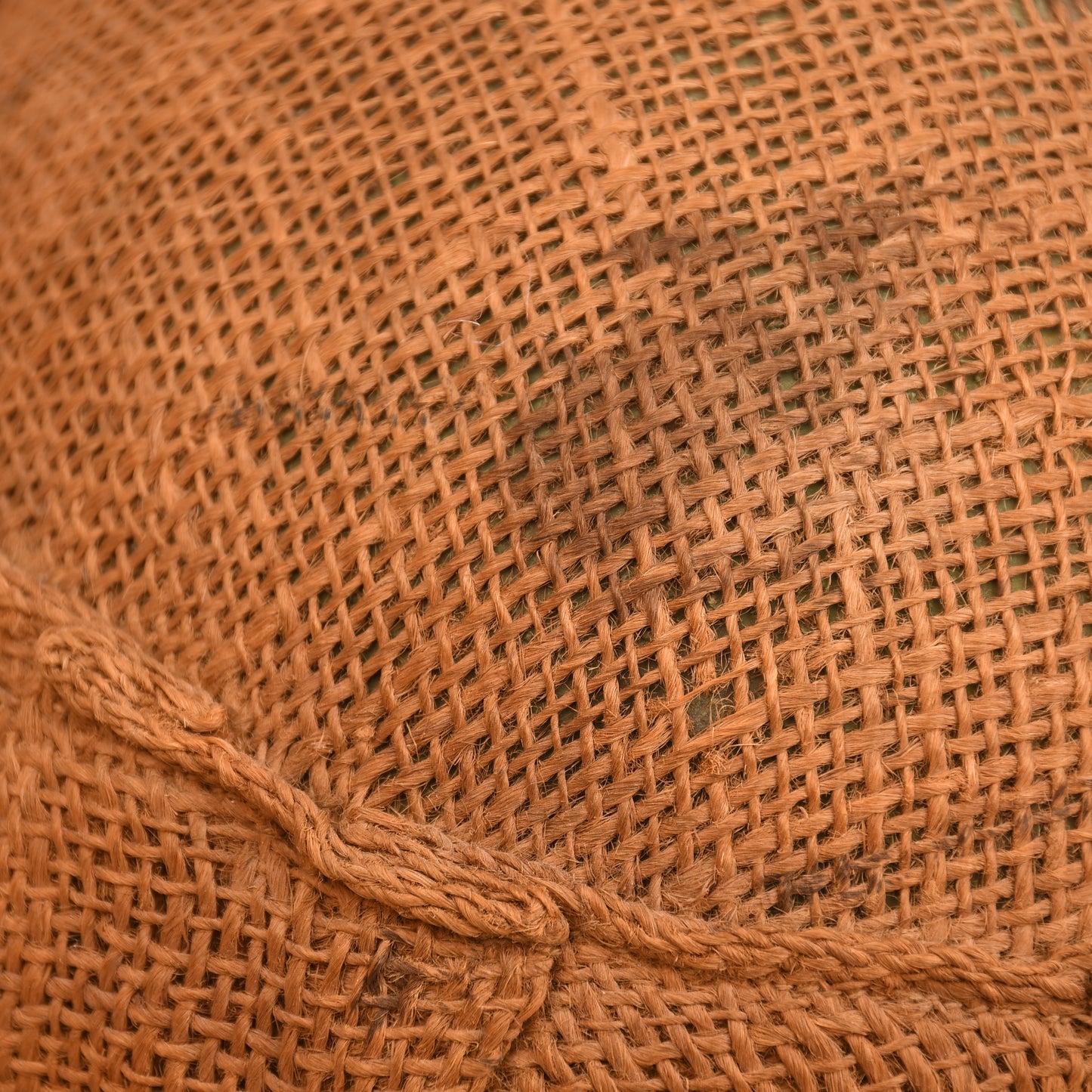 BRITISH WWI 1ST PATTERN BRODIE HELMET WITH A RARE TYPE OF SACKING COVER
