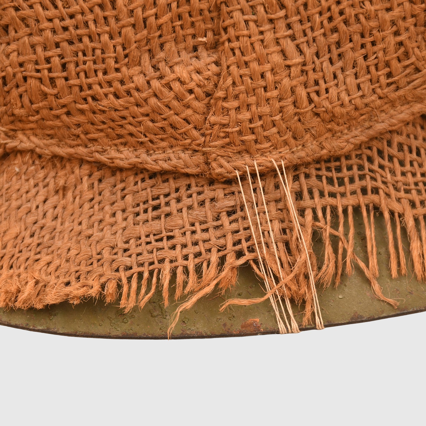 BRITISH WWI 1ST PATTERN BRODIE HELMET WITH A RARE TYPE OF SACKING COVER