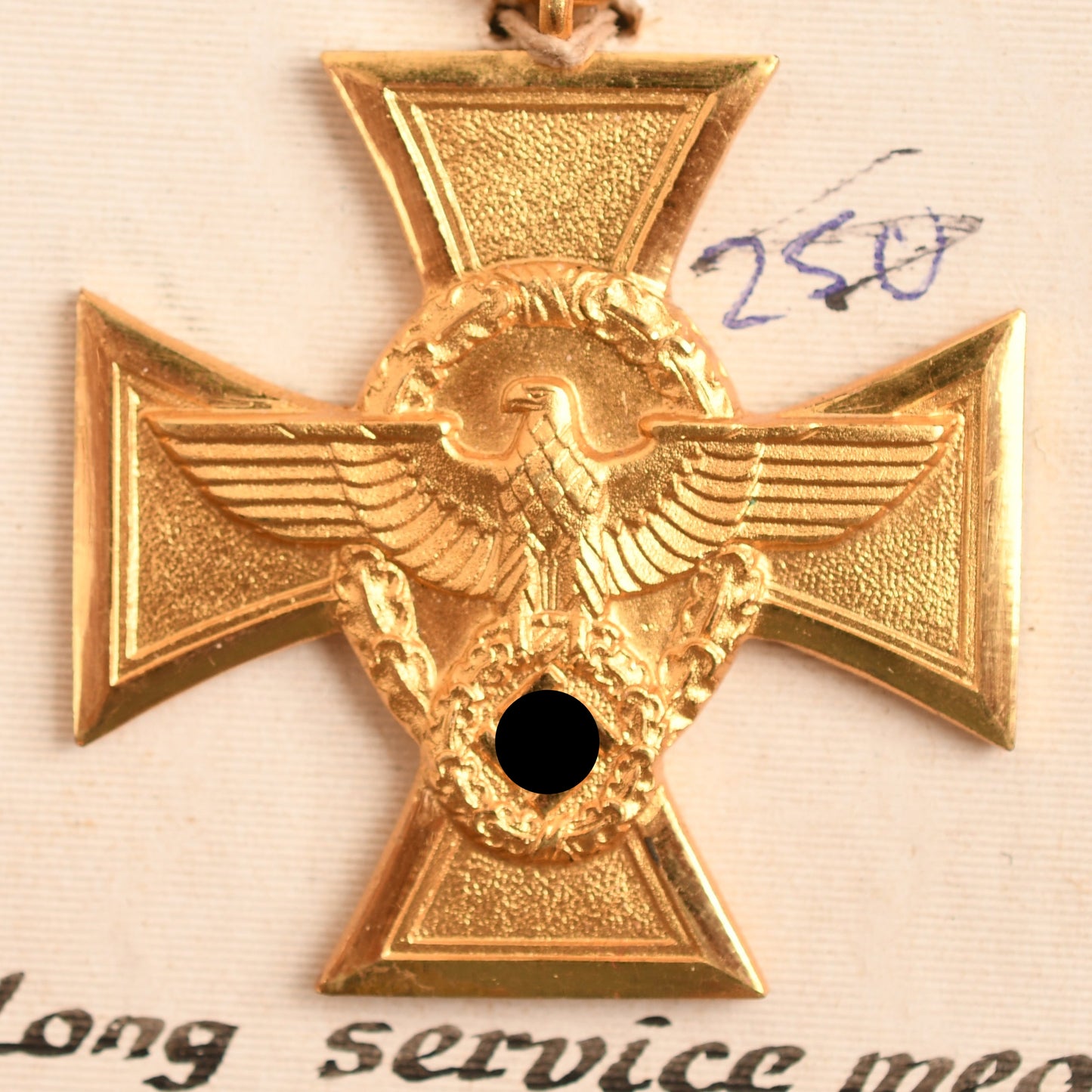GERMAN WWII POLICE 18 YEAR LONG SERVICE MEDAL IN GILT ON CARD