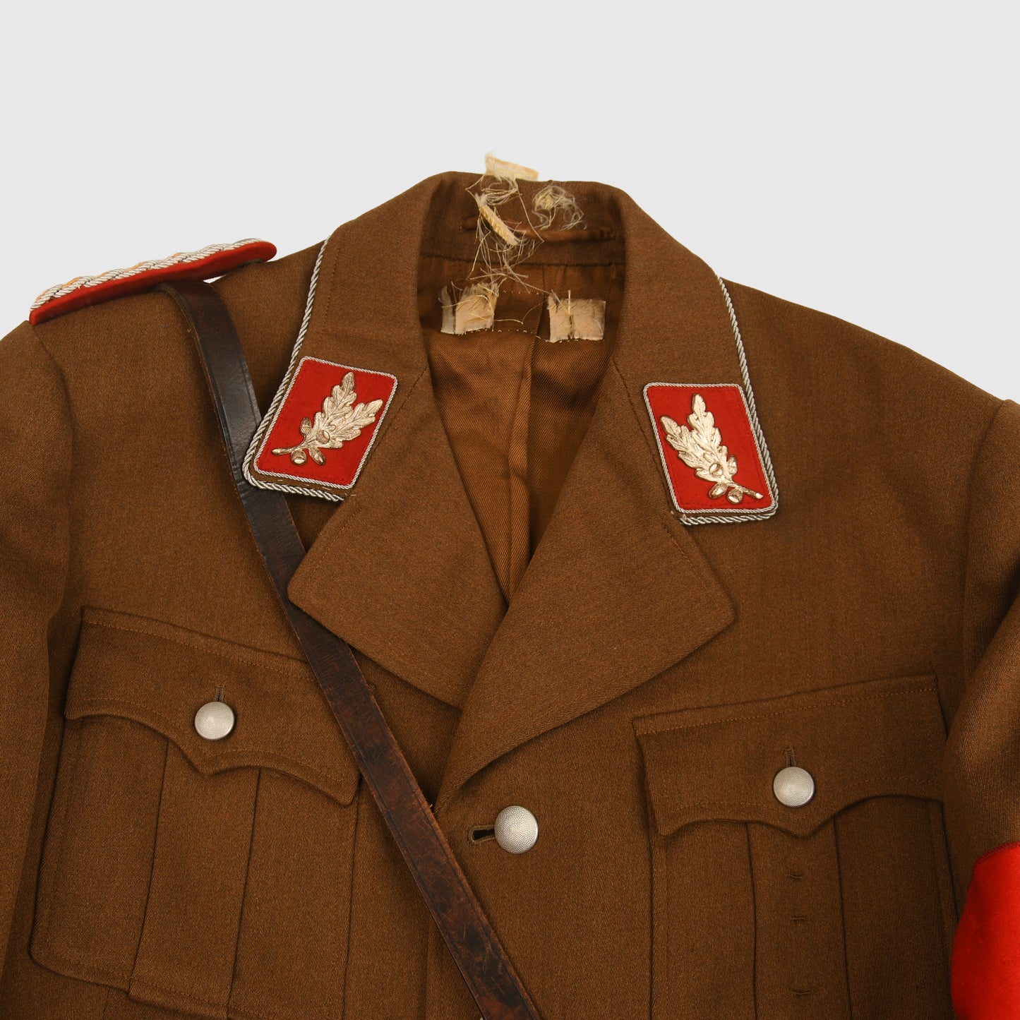 GERMAN WWII SA STANDARTENFUHRER’S TUNIC, BREECHES AND BELT