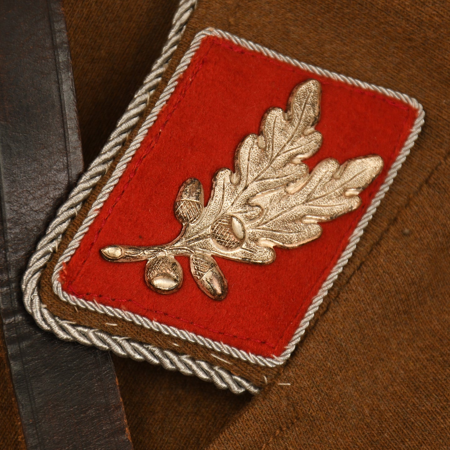 GERMAN WWII SA STANDARTENFUHRER’S TUNIC, BREECHES AND BELT