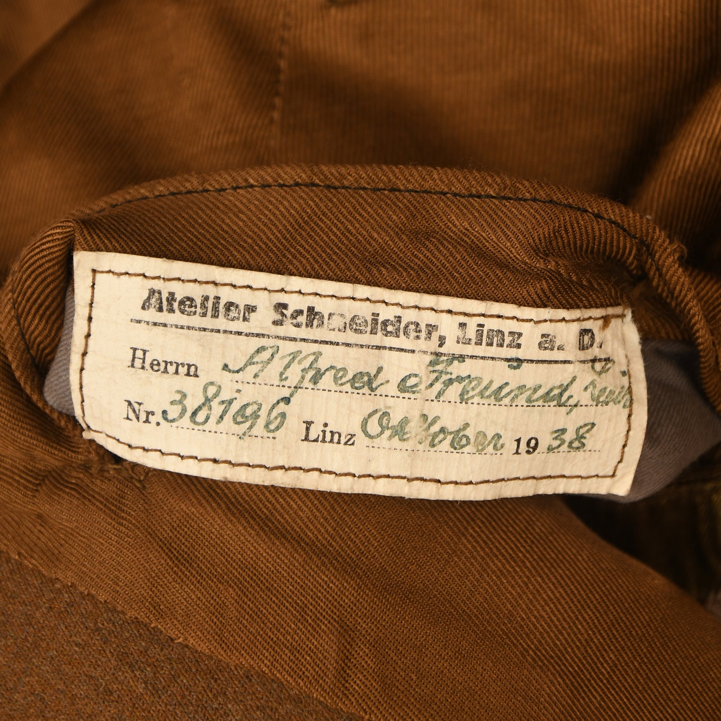 GERMAN WWII SA STANDARTENFUHRER’S TUNIC, BREECHES AND BELT