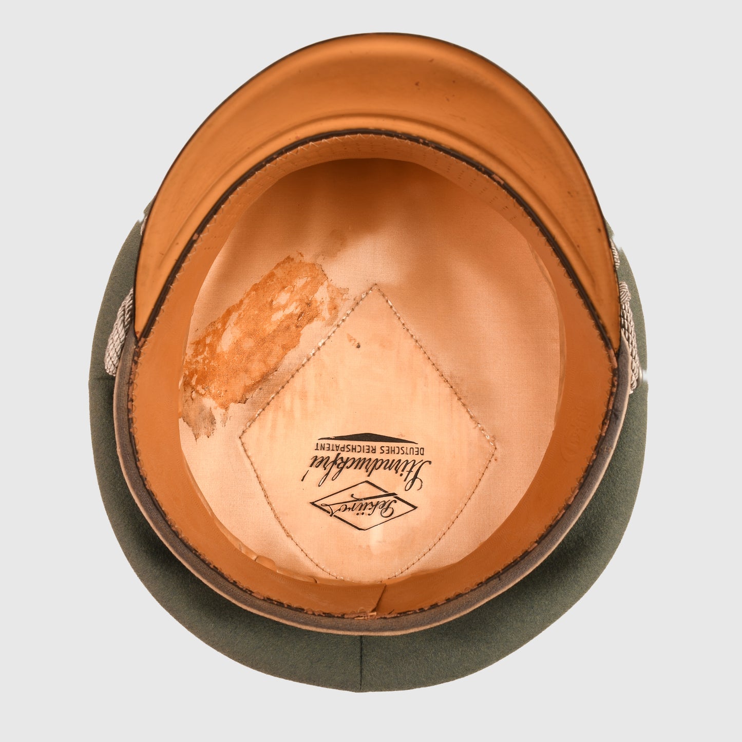 GERMAN WWII COMPLETE INFANTRY HAUPTMANN’S COMBAT TUNIC AND VISOR CAP WITH MEDALS ATTACHED AND BELT