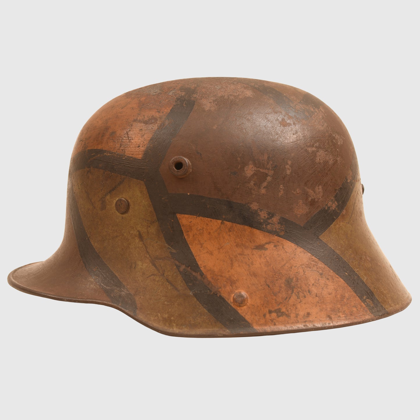GERMAN WWI M.16 CAMOUFLAGE TRENCH HELMET WITH PARTIAL CHINSTRAP