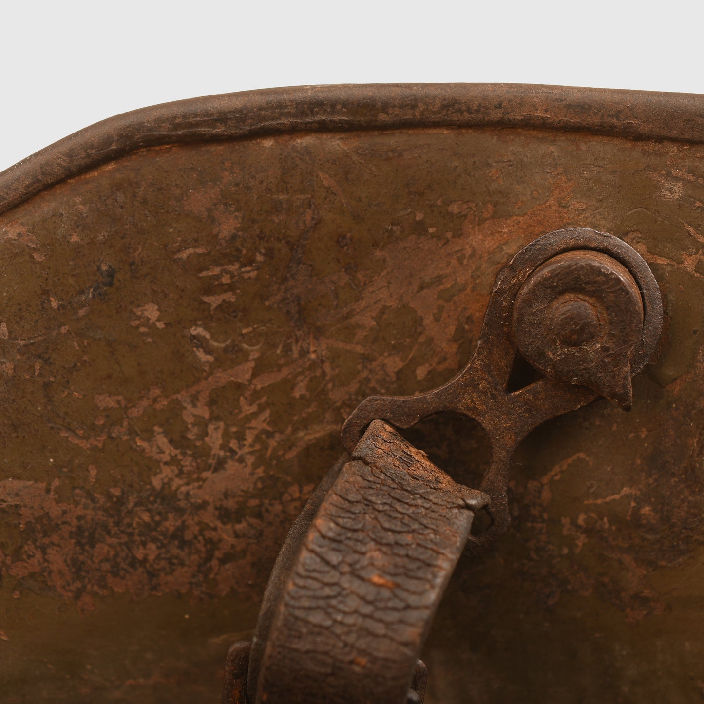 GERMAN WWI M.16 CAMOUFLAGE TRENCH HELMET WITH PARTIAL CHINSTRAP