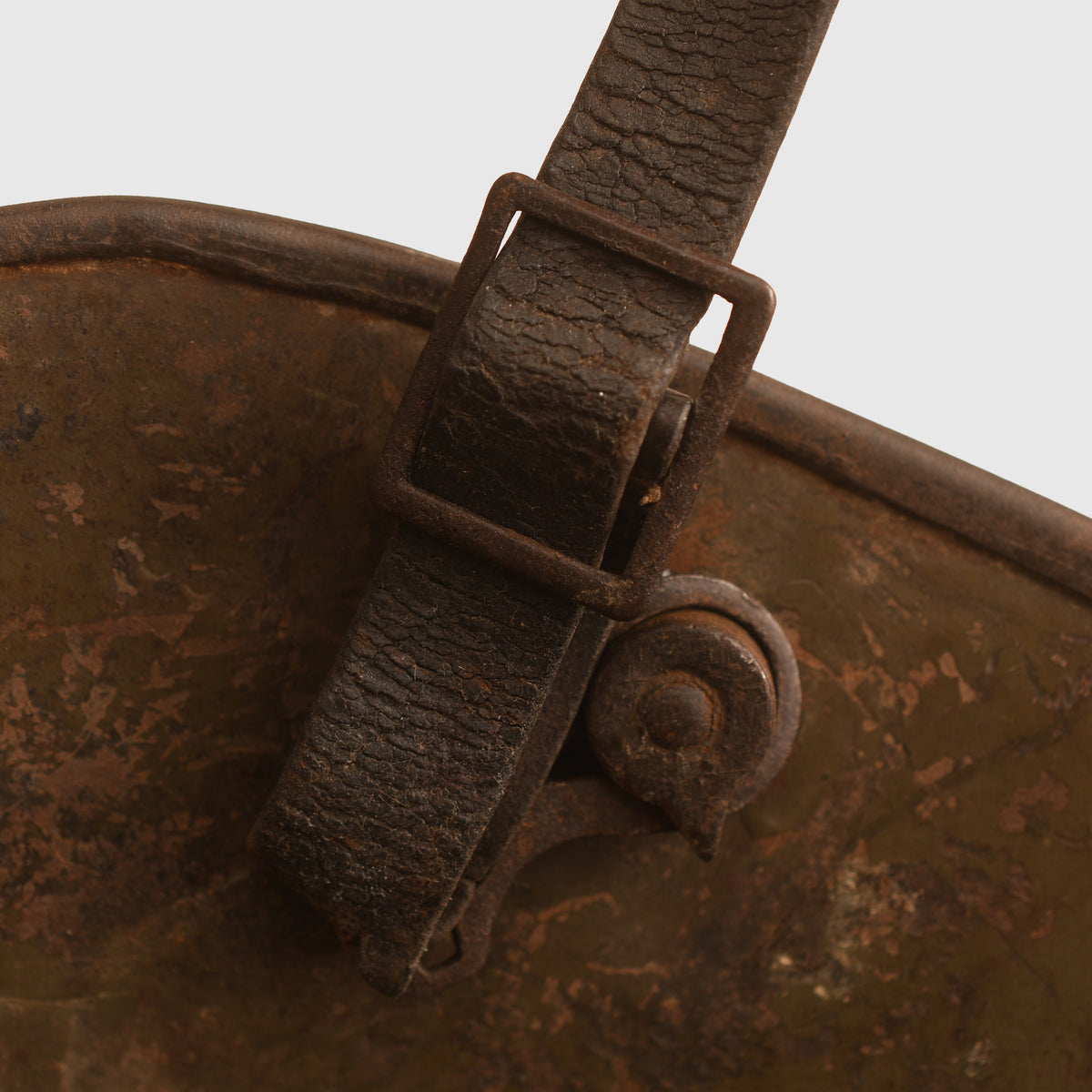 GERMAN WWI M.16 CAMOUFLAGE TRENCH HELMET WITH PARTIAL CHINSTRAP