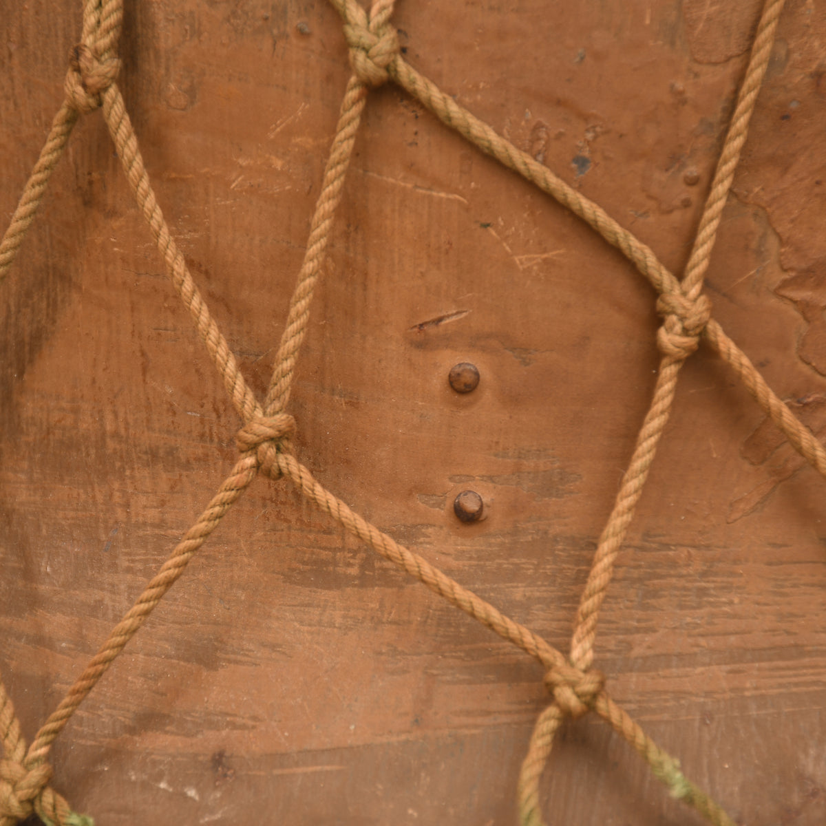 JAPANESE WWII TYPE 90 COMBAT HELMET WITH CAMOUFLAGE NET, IDENTIFIED TO AN INDIVIDUAL SOLDIER