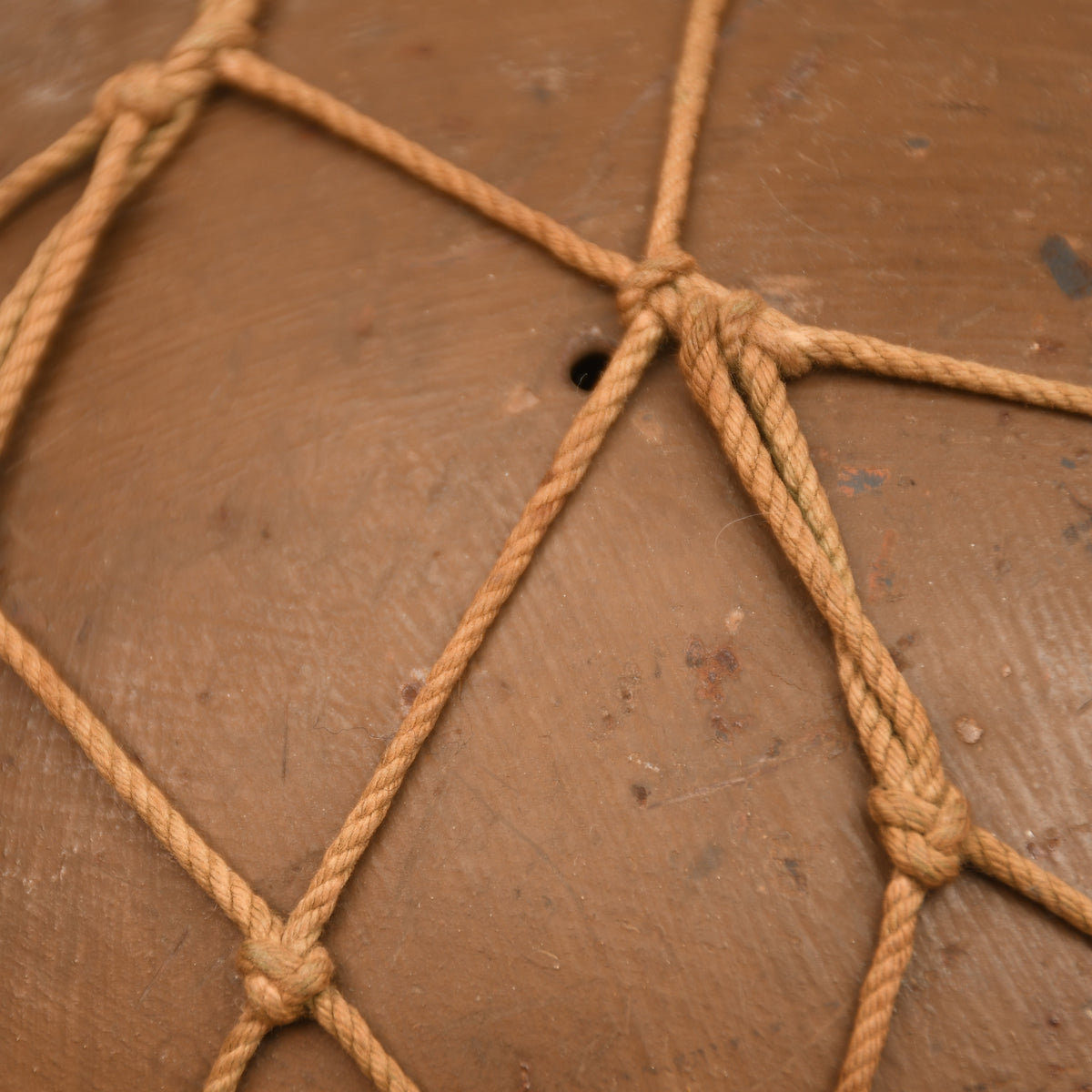 JAPANESE WWII TYPE 90 COMBAT HELMET WITH CAMOUFLAGE NET, IDENTIFIED TO AN INDIVIDUAL SOLDIER
