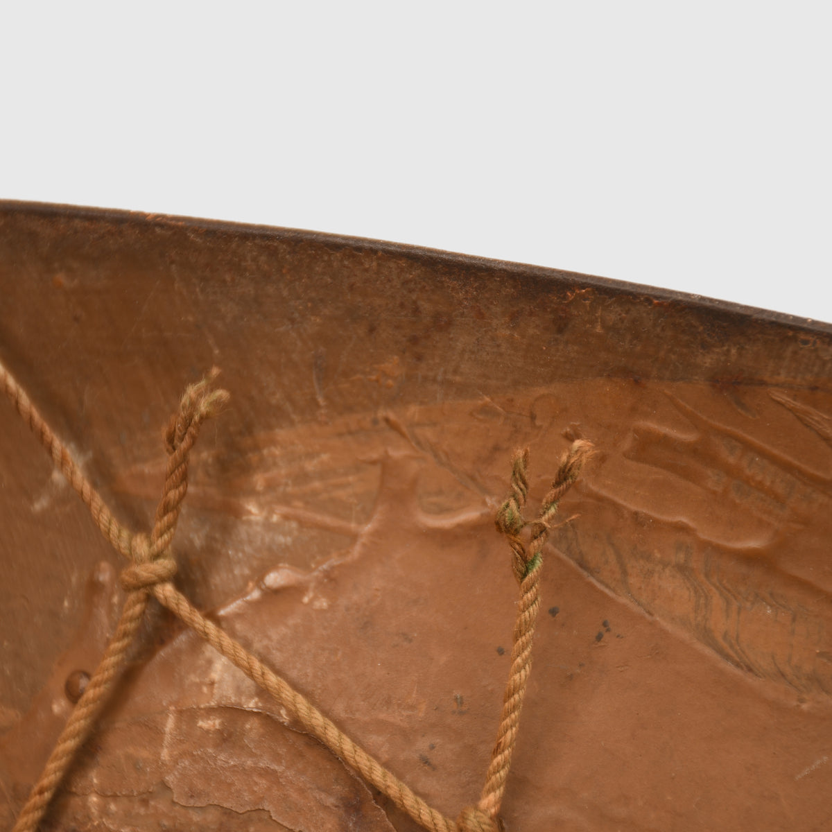JAPANESE WWII TYPE 90 COMBAT HELMET WITH CAMOUFLAGE NET, IDENTIFIED TO AN INDIVIDUAL SOLDIER