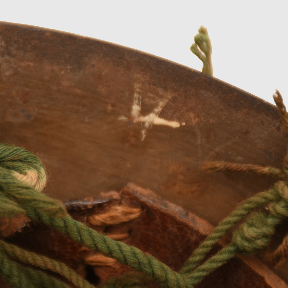 JAPANESE WWII TYPE 90 COMBAT HELMET WITH CAMOUFLAGE NET, IDENTIFIED TO AN INDIVIDUAL SOLDIER