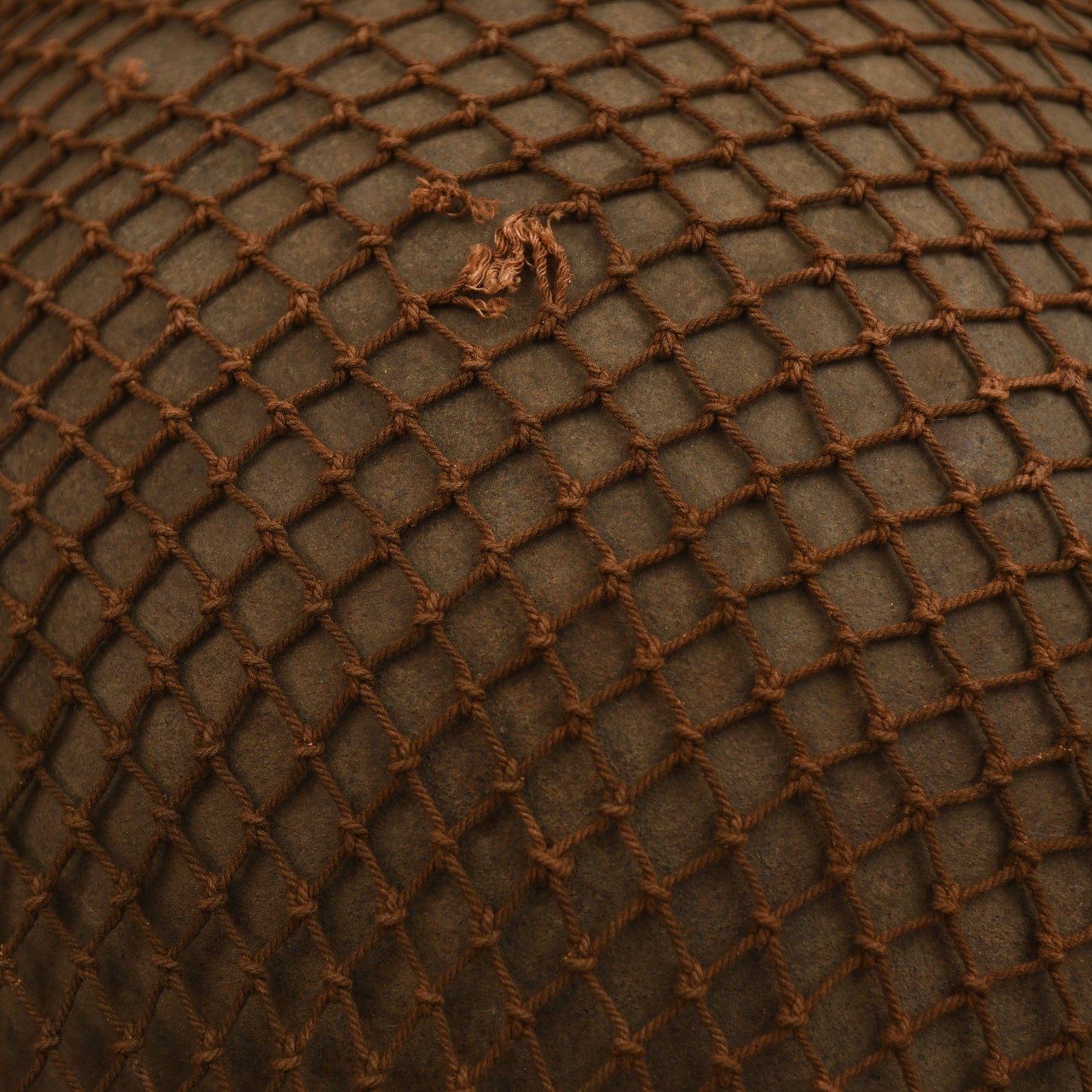 BRITISH 1940 DATED BRODIE HELMET WITH NET COVER